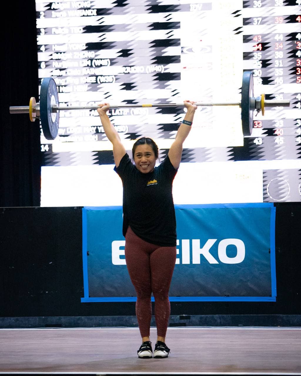 Eugenia Chan competing in Olympic weightlifting on Eleiko platform in Singapore