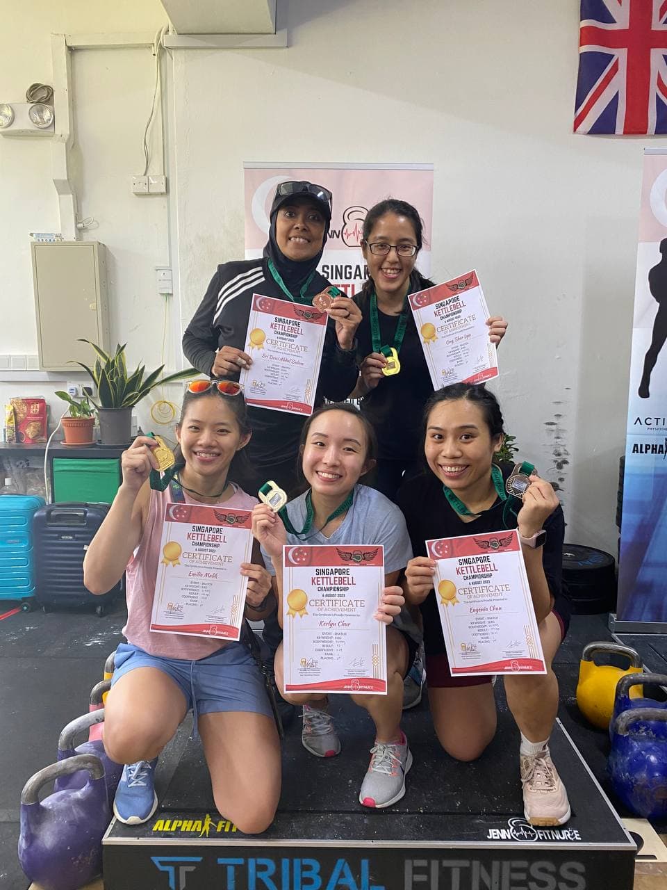 Singapore Kettlebell Championship group with certificates and medals at Tribal Fitness