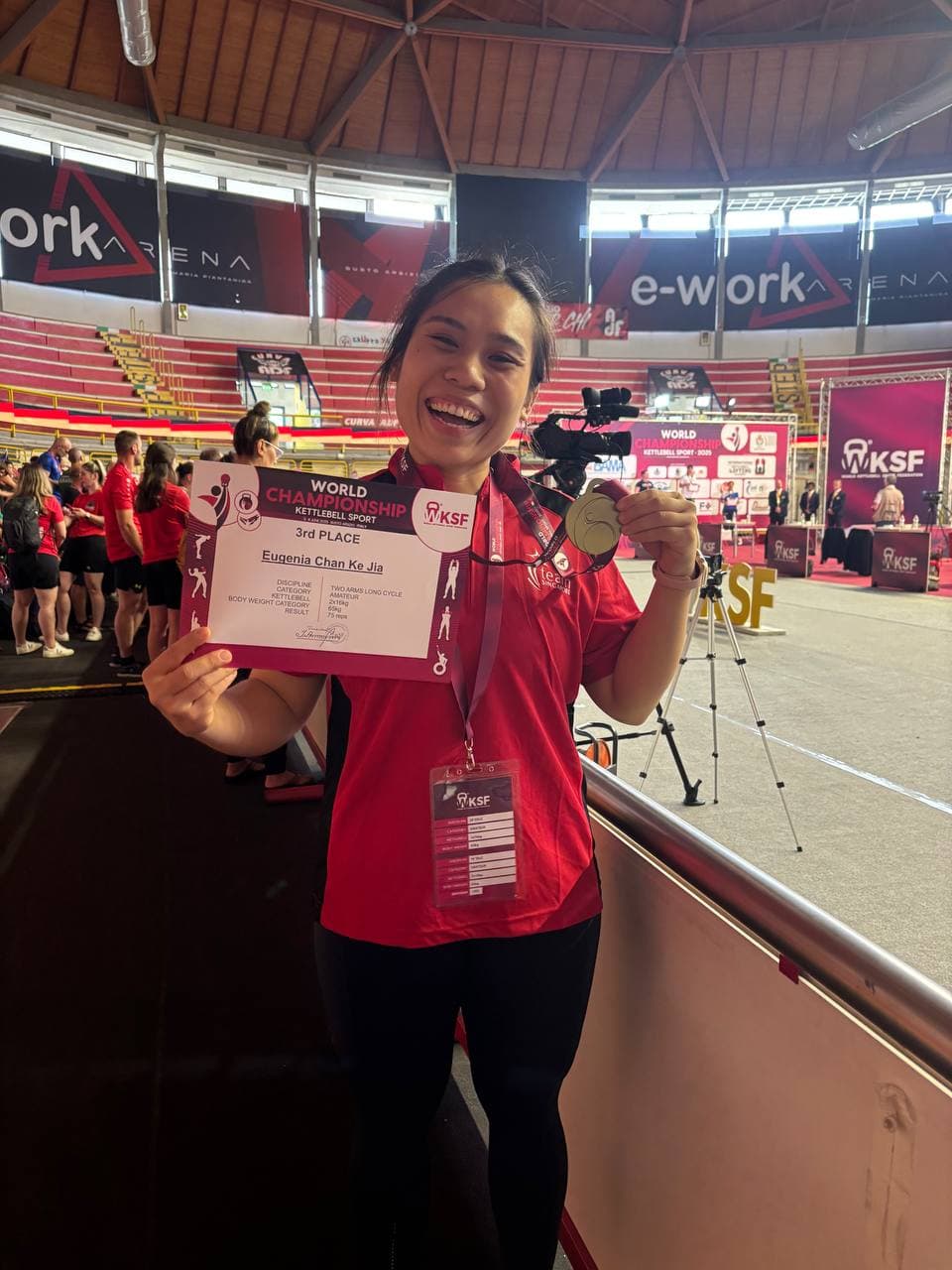 Eugenia Chan with 3rd place medal at WKSF World Championship Italy