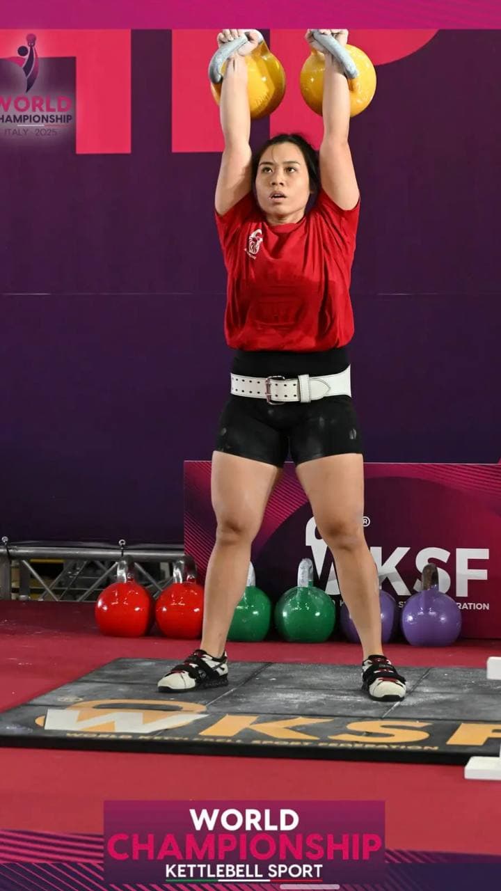 Eugenia Chan competing at WKSF World Kettlebell Sport Championship in Italy